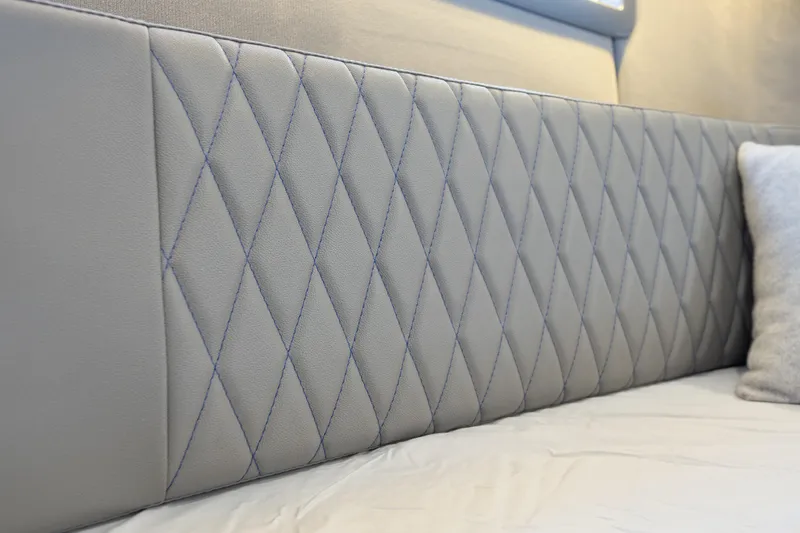 Slide: The Image of Quilted leather headboard in Hanover 347, 2026 model, with elegant diamond stitching. - 42