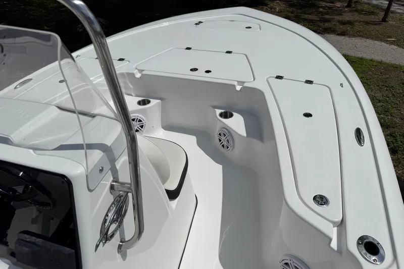 Slide: The Image of 2027 Tidewater 1910 Bay Max boat interior with seating and storage compartments. - 6