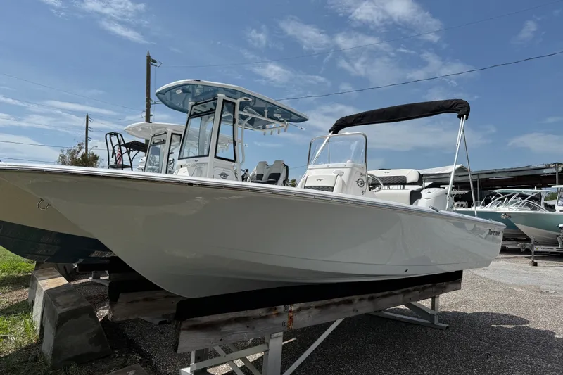 The Image of 2027 Tidewater 1910 Bay Max boat displayed outdoors on a sunny day. - 0