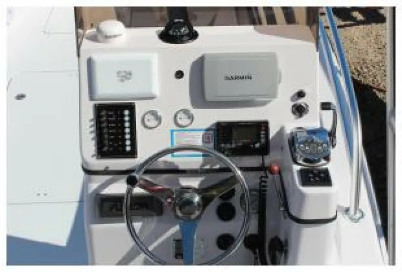 Slide: The Image of The image shows the helm of a 2019 OceanPro 35 boat with various instruments. - 9