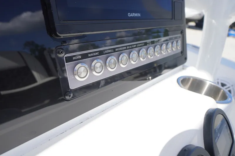 Slide: The Image of Control panel of 2023 Tidewater 220 CC Adventure boat with Garmin display. - 24