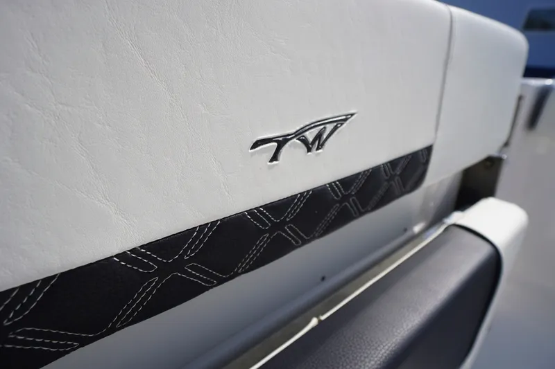 Slide: The Image of 2023 Tidewater 220 CC Adventure boat interior with logo detail. - 41