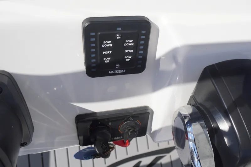 Slide: The Image of Control panel on 2023 Tidewater 220 CC Adventure boat dashboard. - 25