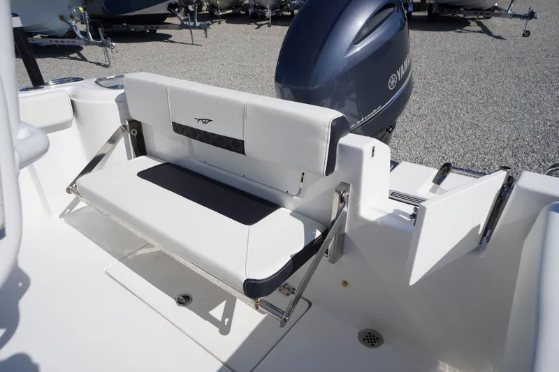 Slide: The Image of 2023 Tidewater 220 CC Adventure boat with foldable rear seat and Yamaha engine. - 44