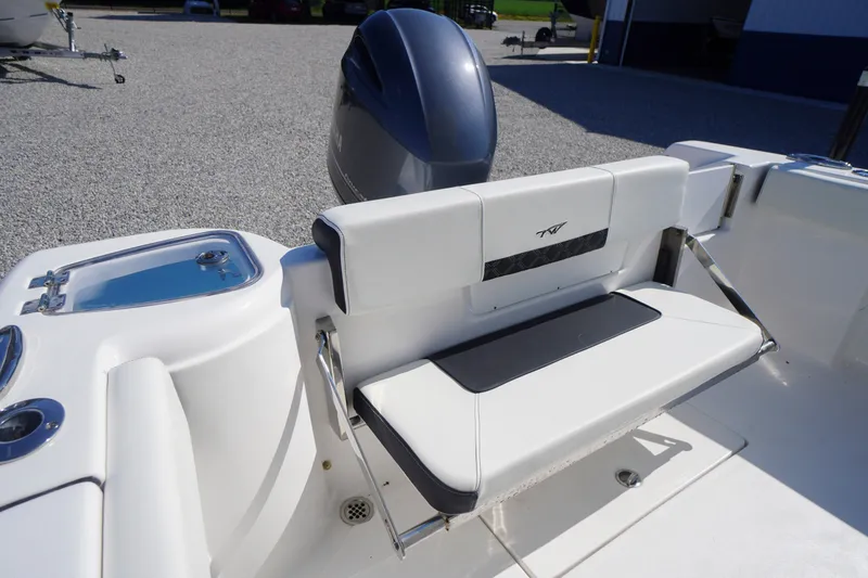 Slide: The Image of 2023 Tidewater 220 CC Adventure boat with sleek seating and modern design. - 43