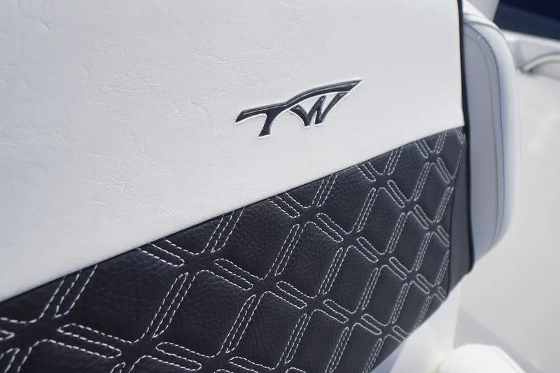 Slide: The Image of 2023 Tidewater 220 CC Adventure boat seat with logo and stylish stitching. - 15