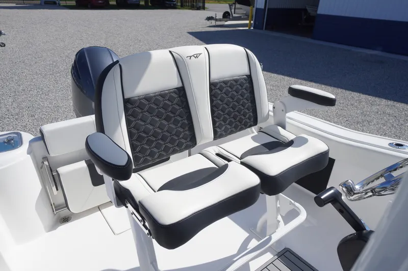 Slide: The Image of 2023 Tidewater 220 CC Adventure boat seats with stylish black and white upholstery. - 17