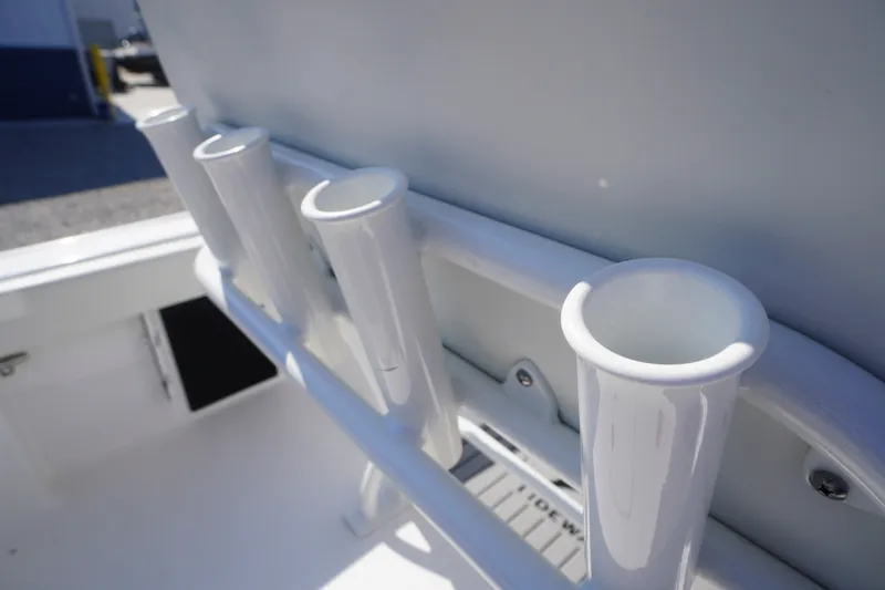 Slide: The Image of Rod holders on a 2023 Tidewater 220 CC Adventure boat, close-up view. - 35