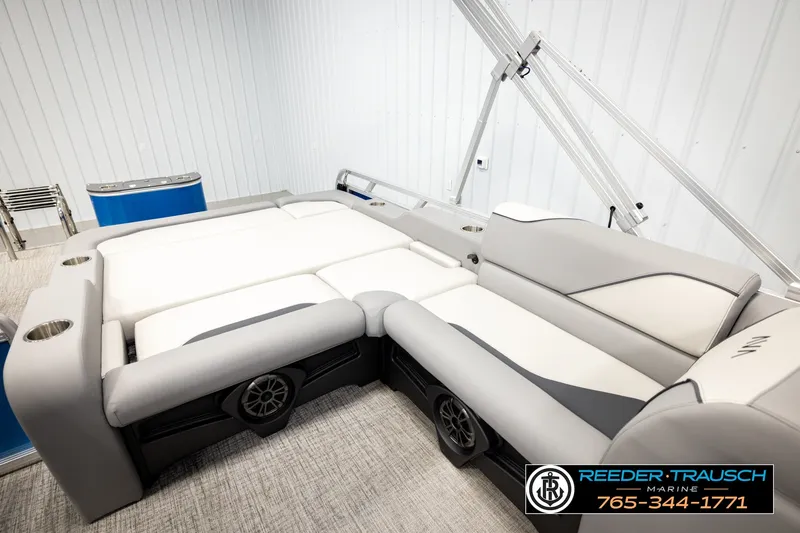 Slide: The Image of 2026 Avalon VEN85 RF boat interior with plush seating and modern design. - 24