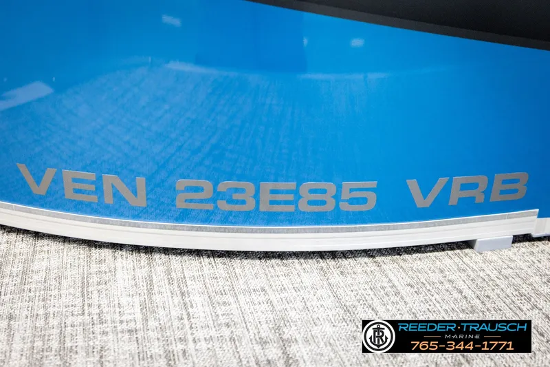 Slide: The Image of 2026 Avalon VEN85 RF boat with "VEN 23E85 VRB" marking, Reeder-Trausch Marine logo visible. - 50