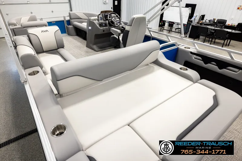 Slide: The Image of Luxurious 2026 Avalon VEN85 RF pontoon boat interior with plush seating and modern helm. - 11