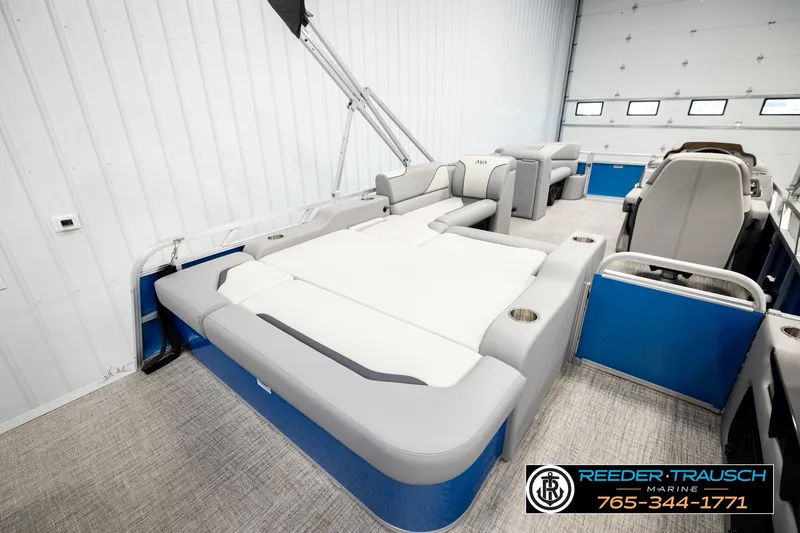 Slide: The Image of Luxurious 2026 Avalon VEN85 RF pontoon boat interior with plush seating and modern design. - 31