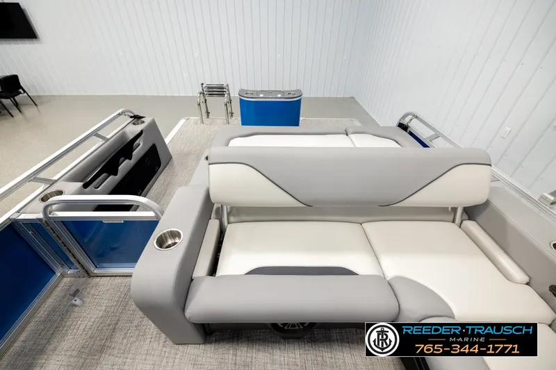 Slide: The Image of 2026 Avalon VEN85 RF boat interior with gray and white seating, cup holders, and modern design. - 15