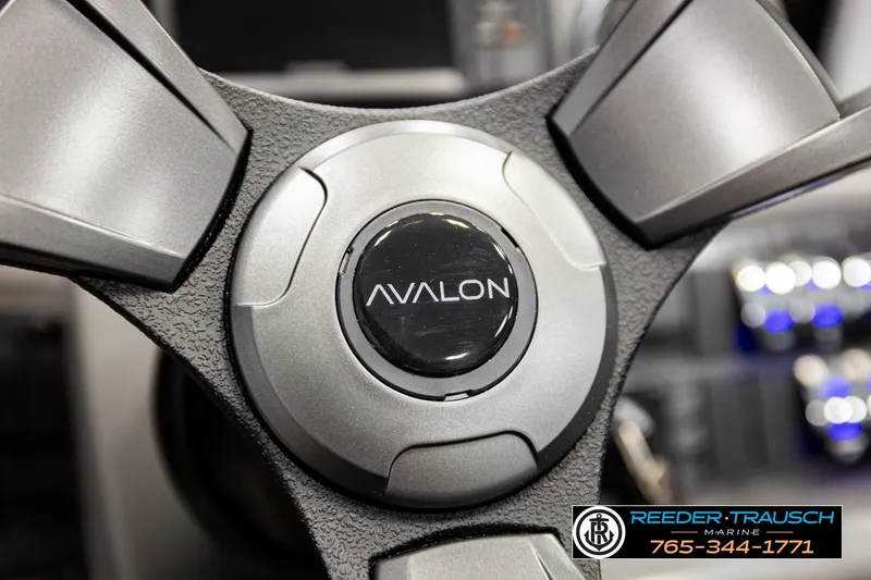 Slide: The Image of Steering wheel of 2026 Avalon VEN85 RF boat, featuring sleek design and branding. - 36