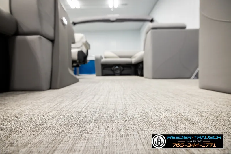 Slide: The Image of Interior of 2026 Avalon VEN85 RF boat with plush seating and carpet flooring. - 48