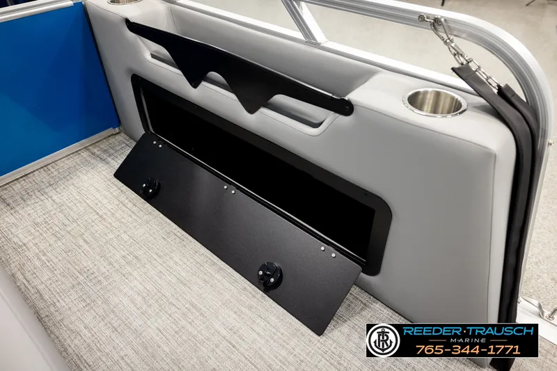 Slide: The Image of Interior of 2026 Avalon VEN85 RF boat with storage compartment and cup holder. - 33