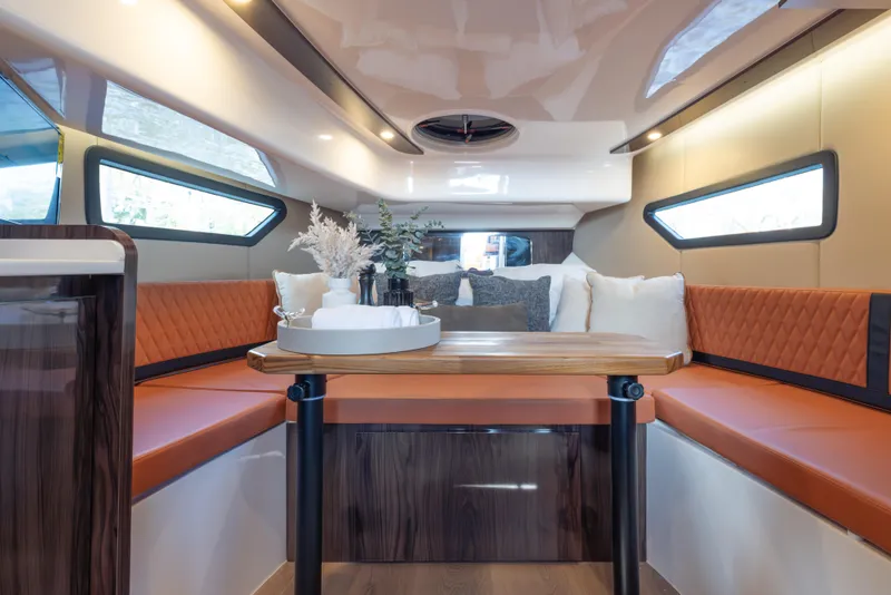Slide: The Image of Luxurious interior of 2026 Hanover 387 yacht with elegant seating and modern decor. - 23