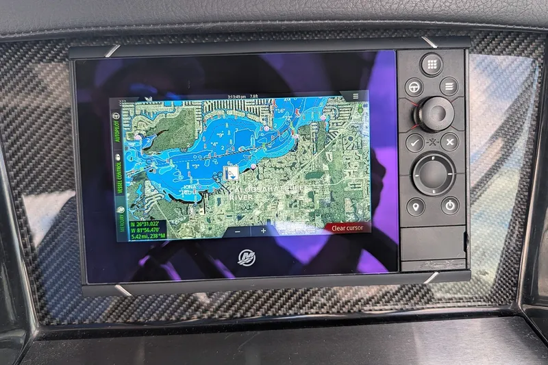 Slide: The Image of GPS navigation screen on 2019 Four Winns H290 OB boat, displaying Caloosahatchee River map. - 18