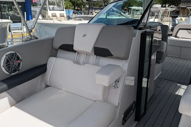 Slide: The Image of 2019 Four Winns H290 OB boat interior with comfortable seating and modern design. - 28