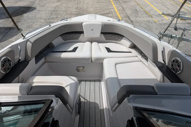 Slide: The Image of 2019 Four Winns H290 OB boat interior with spacious seating and modern design. - 26