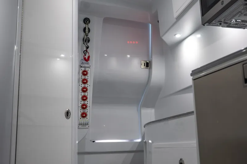Slide: The Image of 2024 Contender 44 Fisharound interior with modern control panel and sleek design. - 14