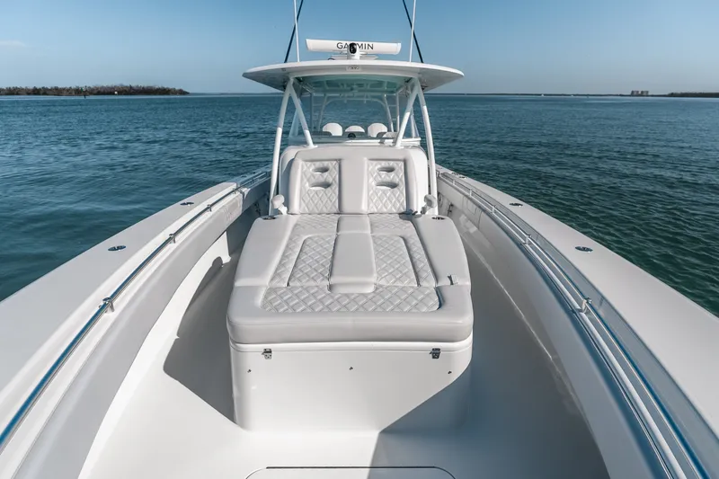 Slide: The Image of 2024 Contender 44 Fisharound boat with luxurious seating on open water. - 41
