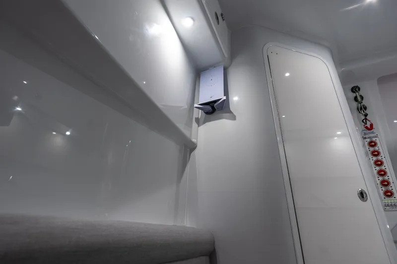 Slide: The Image of Interior of 2024 Contender 44 Fisharound boat, featuring sleek design and modern controls. - 15