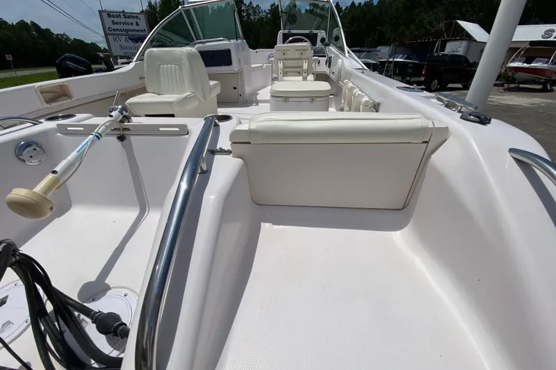 Slide: The Image of 1998 Grady-White Tournament 192 boat interior with seating and steering console. - 6