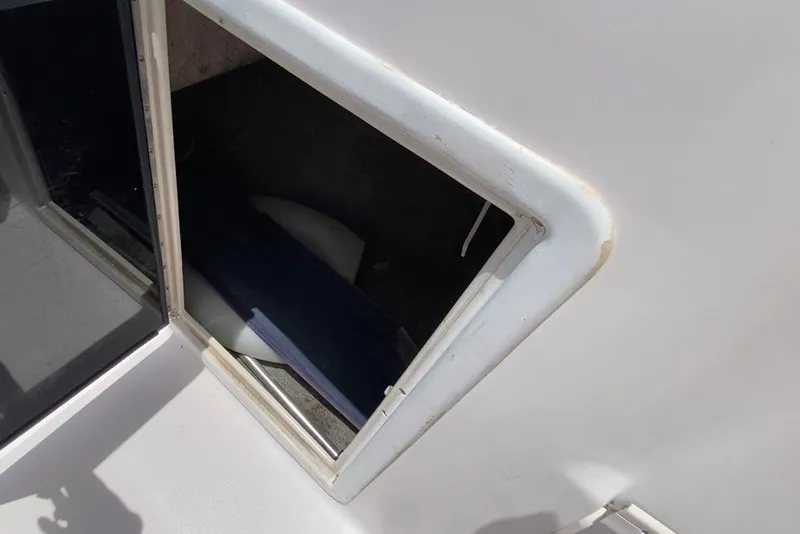 Slide: The Image of Open hatch on 1998 Grady-White Tournament 192 boat deck. - 19