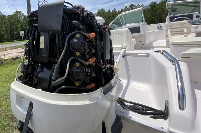 Slide: The Image of 1998 Grady-White Tournament 192 boat engine and interior view. - 16