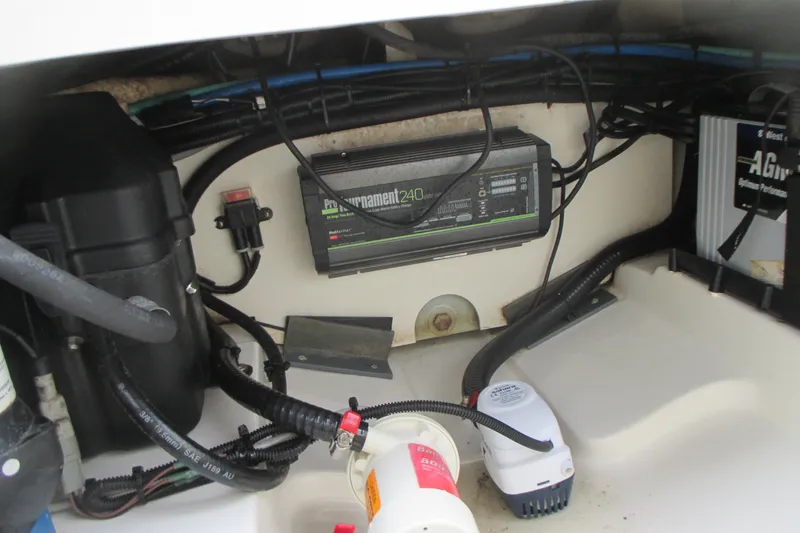 Slide: The Image of Electrical components inside a 2013 Boston Whaler 230 Vantage boat. - 17