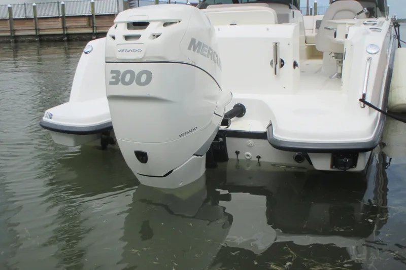 Slide: The Image of Boston Whaler 230 Vantage 2013 with Mercury Verado 300 engine at dock. - 3