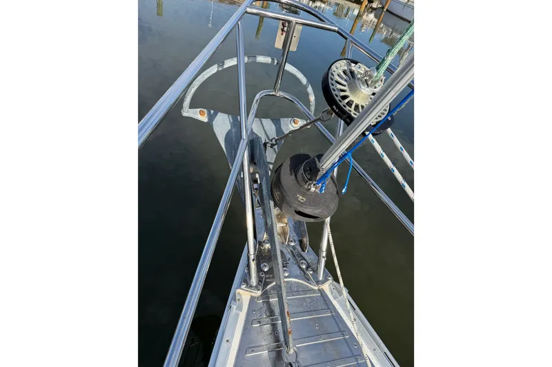 Slide: The Image of Bow of a 1989 Hylas 44 sailboat with anchor and rigging details. - 53