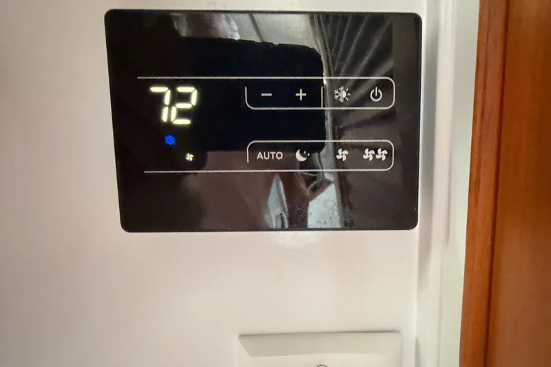 Slide: The Image of Digital control panel displaying temperature settings on a 1989 Hylas 44 yacht. - 51
