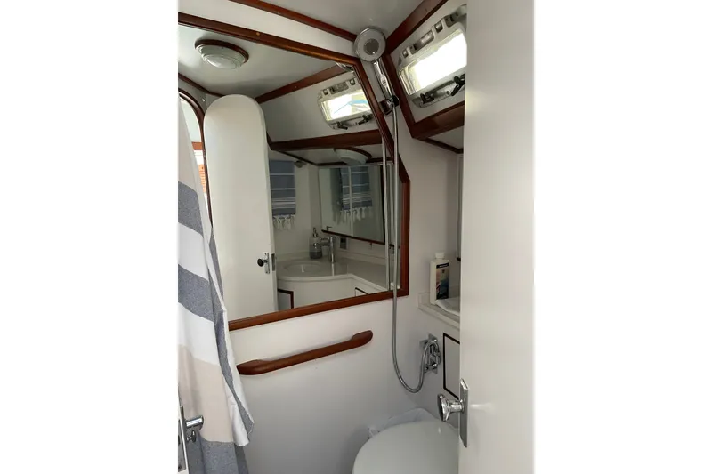 Slide: The Image of Bathroom interior of 1989 Hylas 44 yacht with shower and mirror. - 40