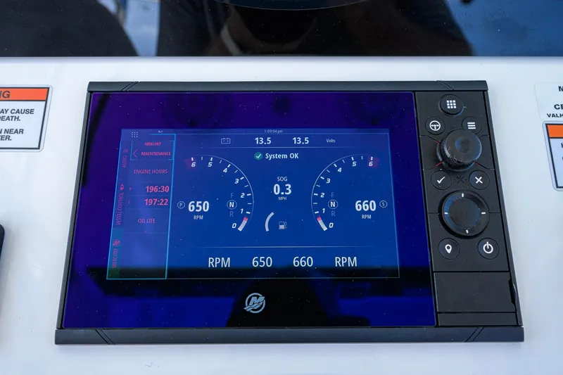 Slide: The Image of 2025 Valhalla Boatworks V-33 dashboard display showing RPM and system status. - 22