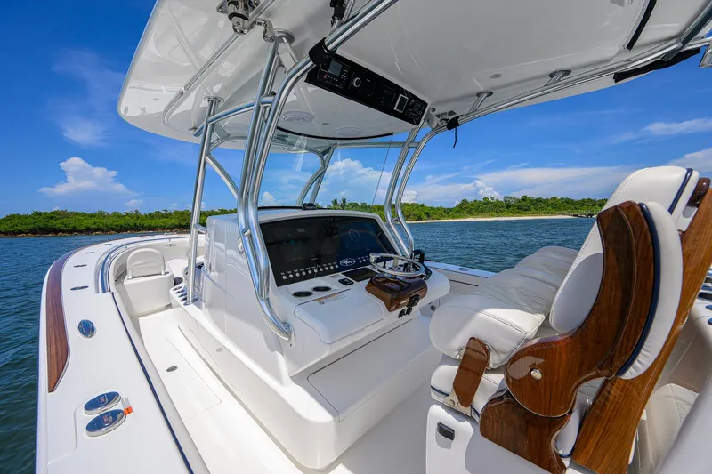 Slide: The Image of 2025 Valhalla Boatworks V-33 cockpit with sleek design, advanced controls, and luxurious seating. - 18