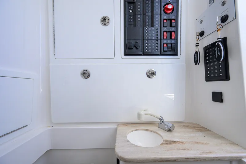 Slide: The Image of 2025 Valhalla Boatworks V-33 interior with control panel and sink. - 71