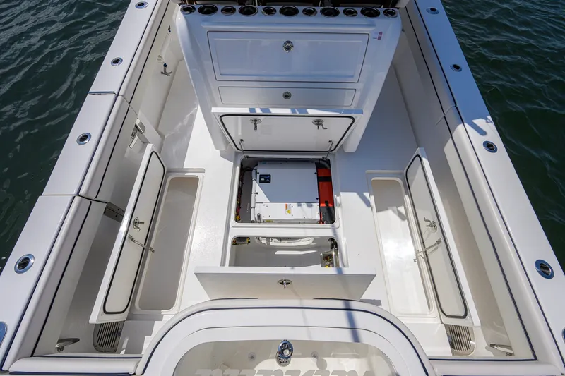 Slide: The Image of 2025 Valhalla Boatworks V-33 deck with open storage compartments and clean design. - 60