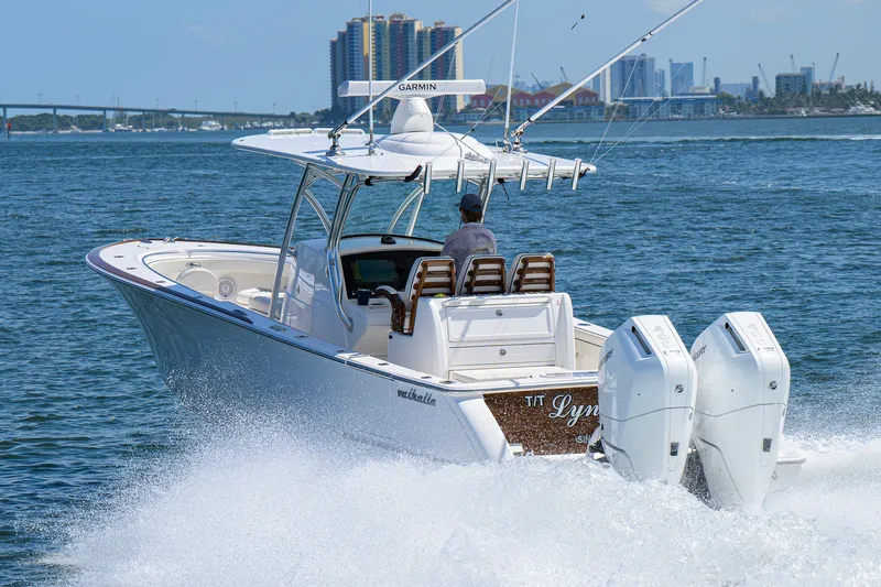 Slide: The Image of 2025 Valhalla Boatworks V-33 cruising on open water with twin engines. - 15