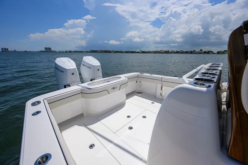 Slide: The Image of 2025 Valhalla Boatworks V-33 with dual Mercury engines on a sunny day. - 49