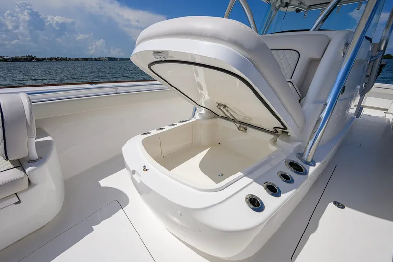 Slide: The Image of 2025 Valhalla Boatworks V-33 open storage compartment on deck, ocean view background. - 41