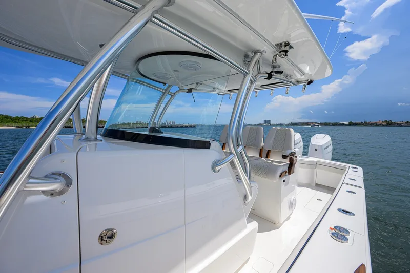 Slide: The Image of 2025 Valhalla Boatworks V-33 on water, showcasing sleek design and luxurious seating. - 29