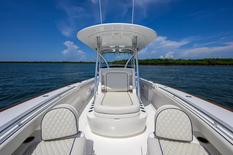 Slide: The Image of 2025 Valhalla Boatworks V-33 on water, featuring luxurious seating and sleek design. - 39