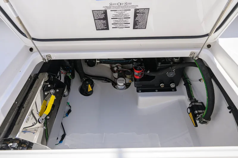 Slide: The Image of 2025 Valhalla Boatworks V-33 engine compartment showcasing mechanical components and wiring. - 66
