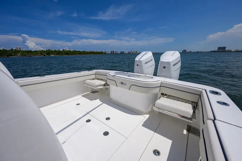 Slide: The Image of 2025 Valhalla Boatworks V-33 with twin Mercury engines on open water. - 51