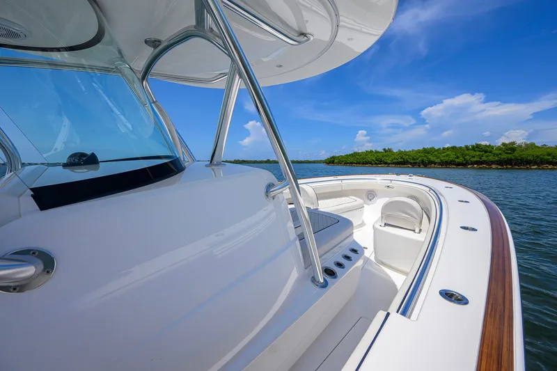 Slide: The Image of 2025 Valhalla Boatworks V-33 cruising on a sunny day, showcasing sleek design and luxury. - 30