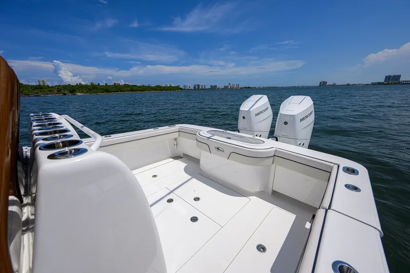 Slide: The Image of 2025 Valhalla Boatworks V-33 with twin Mercury engines on open water. - 46