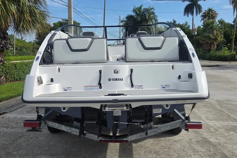 Slide: The Image of 2024 Yamaha Boats SX250 rear view, showcasing sleek design and modern features. - 4