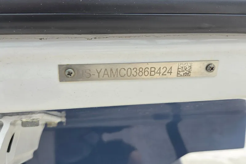 Slide: The Image of 2024 Yamaha Boats SX250 identification plate with serial number and QR code. - 17